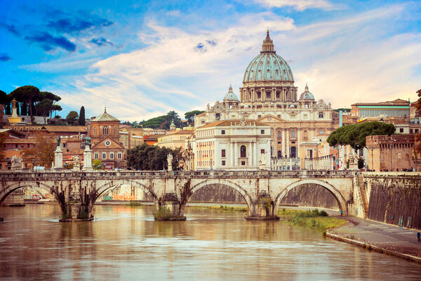 View of Saint Peter cathedral and bridge Saint Angel, Rome, Italy
