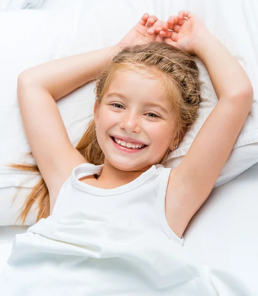 Smiling little girl woke up — Stock Photo, Image