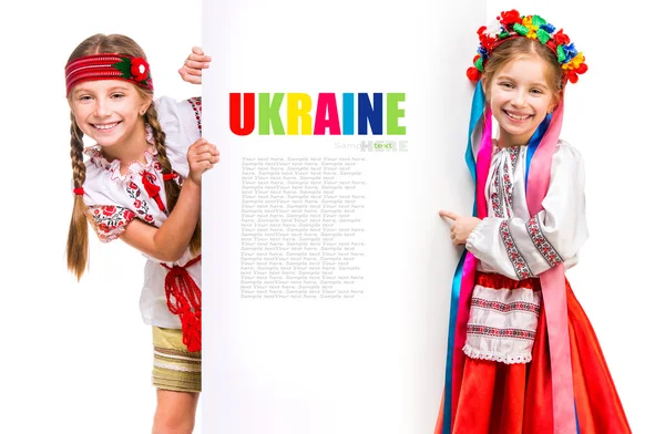 Girls in  Ukrainian costume and  board — Stock Photo, Image