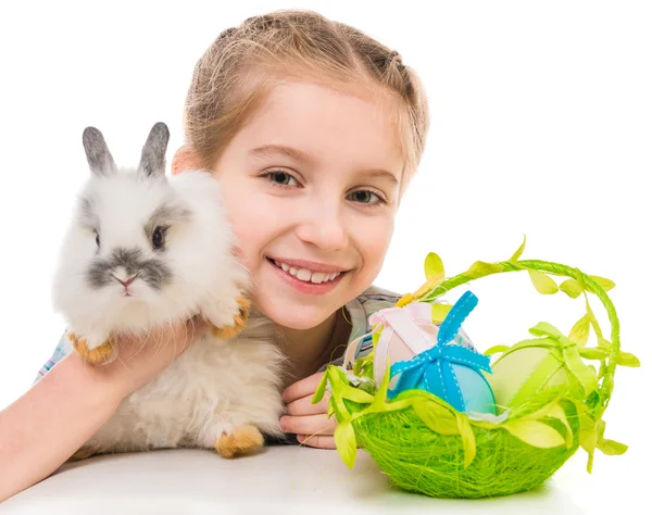 Little girl with a rabbit — Stockfoto