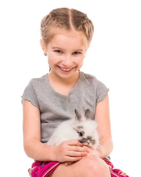 Petite fille avec un lapin — Photo