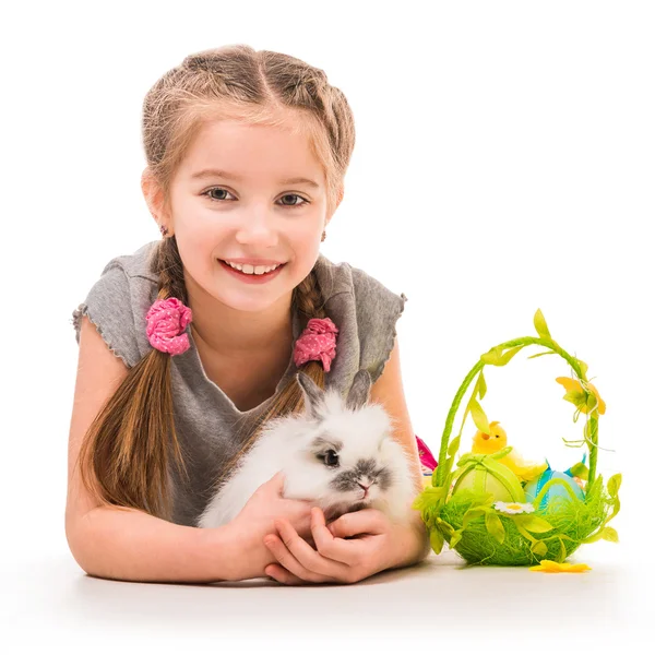 Little girl with a rabbit — Stockfoto