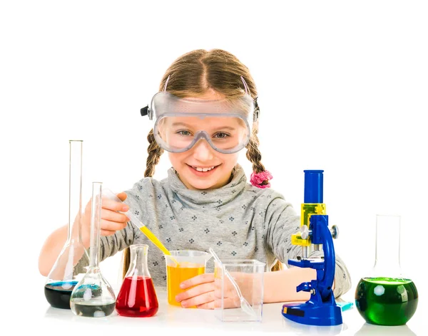 Menina com frascos para química — Fotografia de Stock