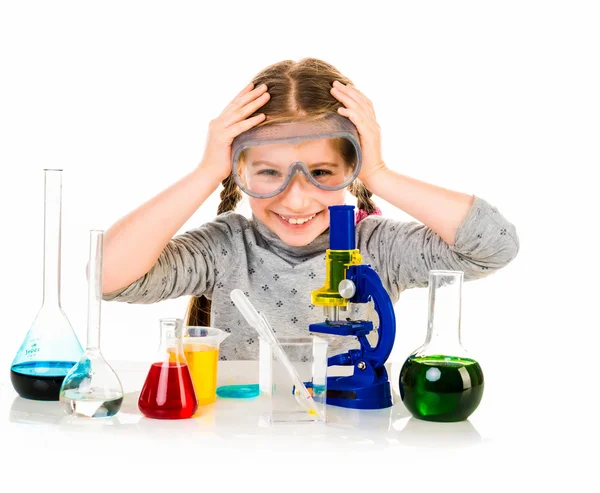 Menina com frascos para química — Fotografia de Stock