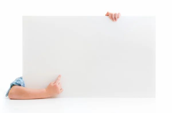 Mãos de menina segurando cartaz — Fotografia de Stock