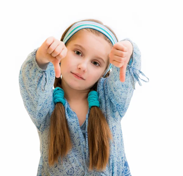Little girl with thumbs down — Stock Photo, Image