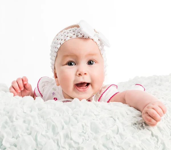 Babymeisje met lint op hoofd — Stockfoto