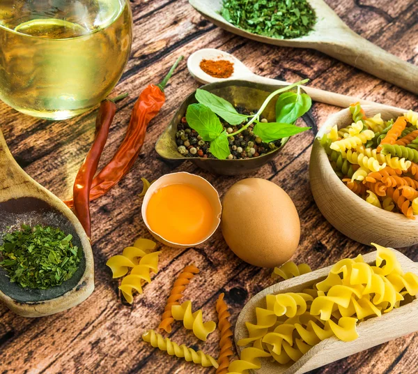 Uncooked pasta and spices — Stock Photo, Image