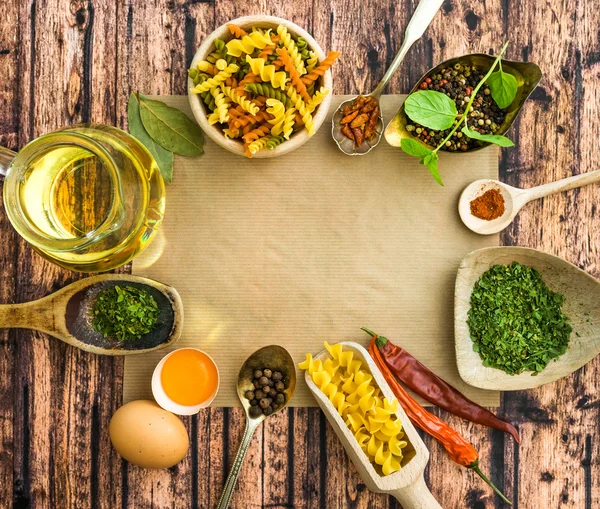 Uncooked pasta and spices — Stock Photo, Image