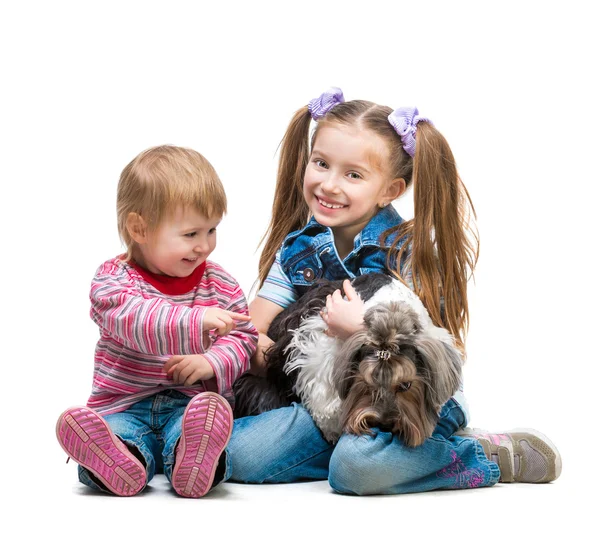 Happy  sisters  with dog — Stock Photo, Image