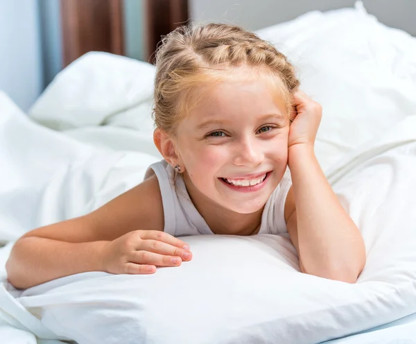 Smiling little girl woke up — Stock Photo, Image