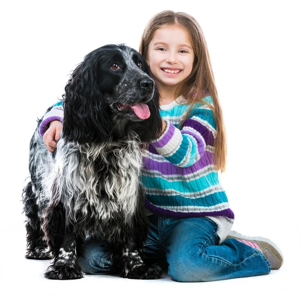 Bambina con cocker spaniel — Foto Stock