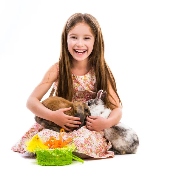 Little girl with her  rabbits — Stock Photo, Image