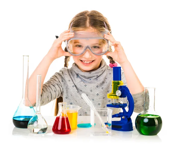 Menina com frascos para química — Fotografia de Stock