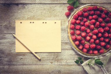 Tart with raspberries   with  paper sheet