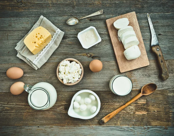 Milk products   on  wooden Sloley — Stockfoto