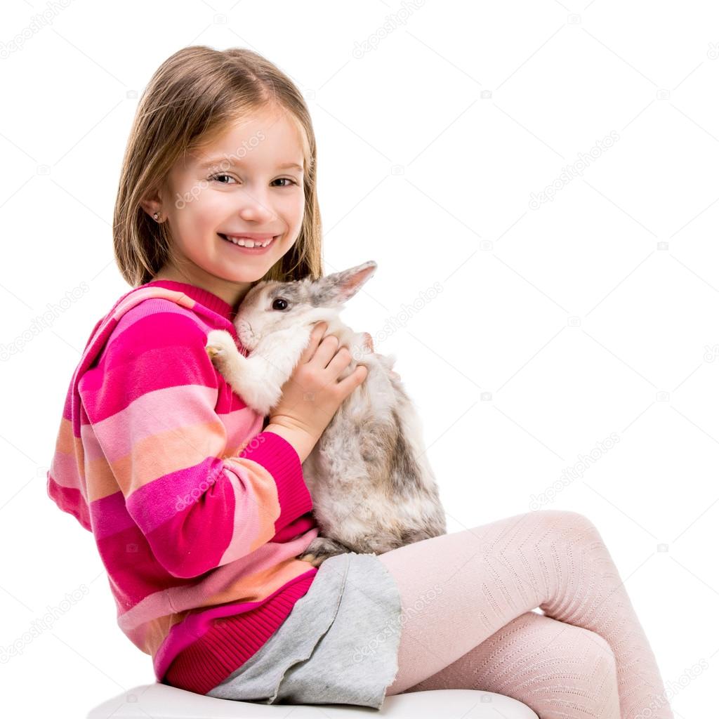 cute girl  with baby rabbit