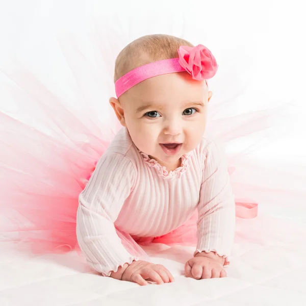 Six-month girl in  pink skirt — Stock Photo, Image