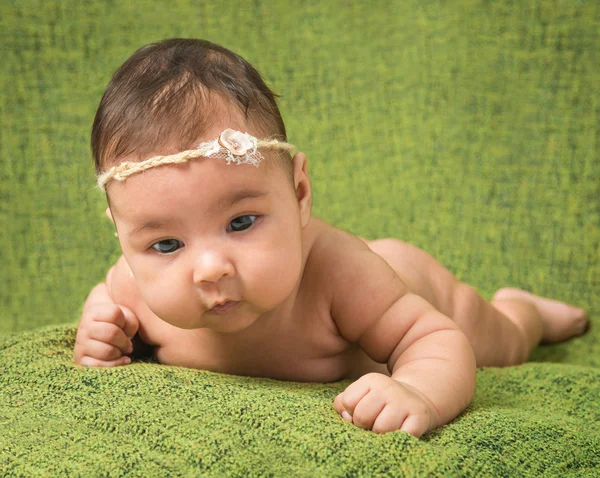 Two-month-old girl with decoration on a head — Stock Photo, Image
