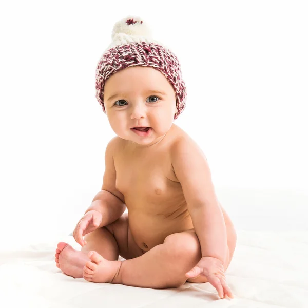 Baby flicka i en brun hatt — Stockfoto