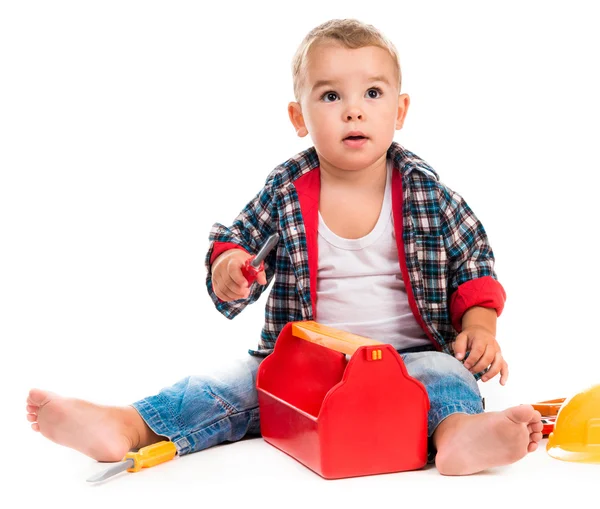 Liten pojke spelar toy verktyg — Stockfoto