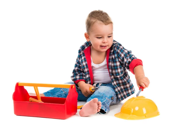 Menino brincando brinquedo ferramentas — Fotografia de Stock