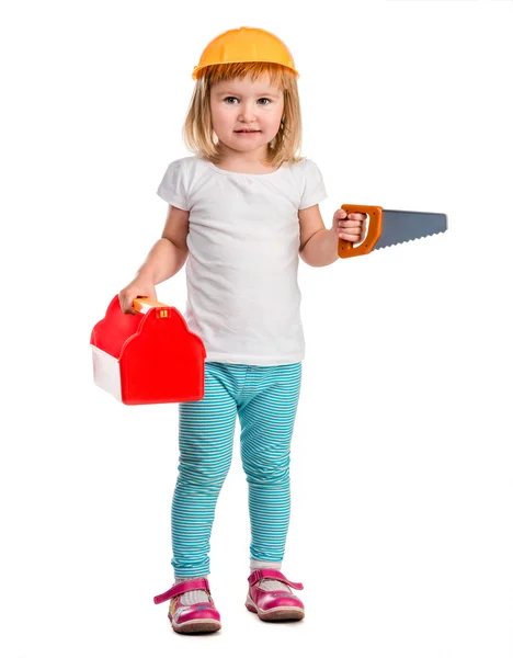 Kleines Mädchen spielt mit Instrumenten — Stockfoto