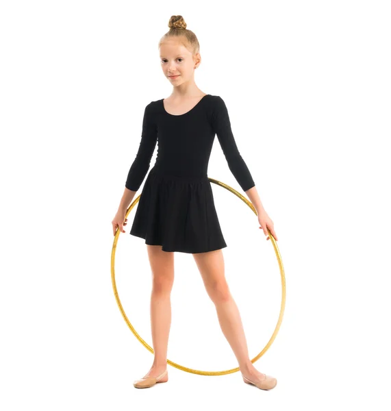 Little gymnast doing exercise with hoop — Stock Photo, Image