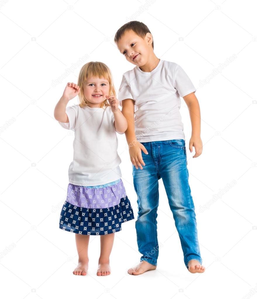 little girl and boy in white shirts