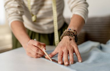 Woman Drawing Line On Fabric With Ruler Diy Sewing At Home