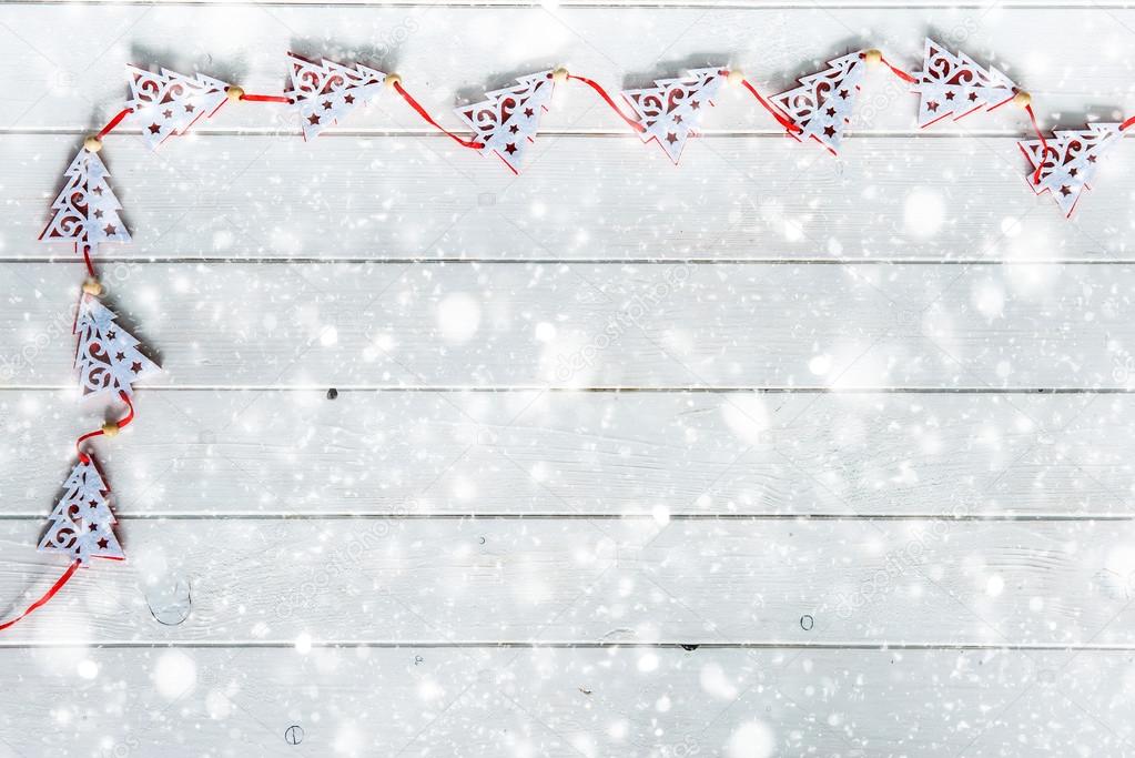 planks under snow with decorations