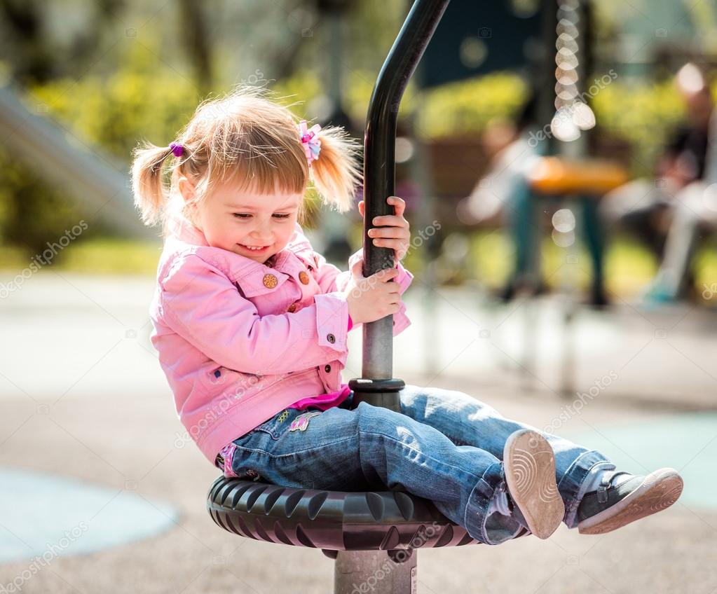 Cute little girl on  playground