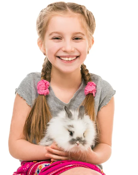 Little girl with a rabbit — Stockfoto