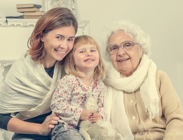 Greatgrandmother with two greatgranddaughter and granddaughter — Stock Photo, Image