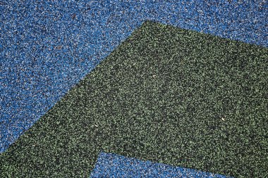 Doku. Çocuk Bahçesi kat. Kauçuk ve taşlar.