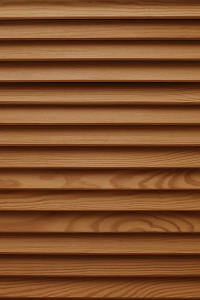 Scudo con un gran numero di tronchi di legno paralleli texture. Tende di legno . — Foto Stock