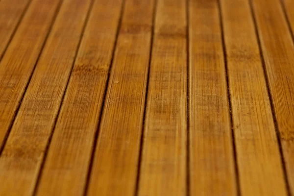 Schild met een groot aantal parallelle houten logboeken textuur. Houten jaloezieën. — Stockfoto