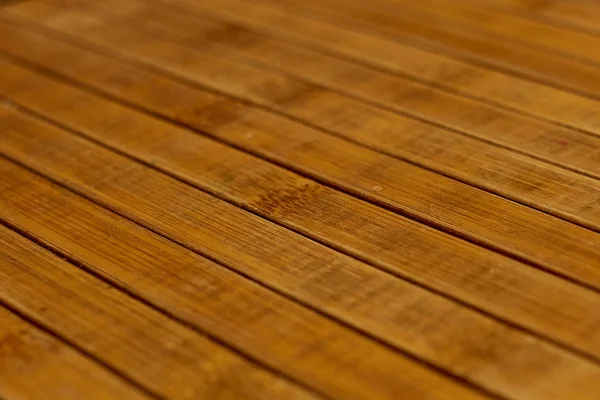 Schild met een groot aantal parallelle houten logboeken textuur. Houten jaloezieën. — Stockfoto