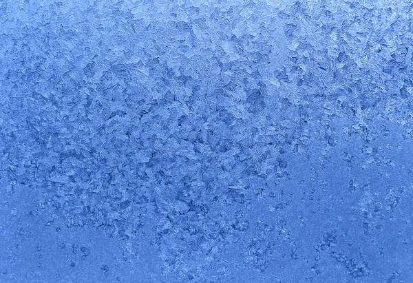 Natural ice pattern on winter glass — Stock Photo, Image