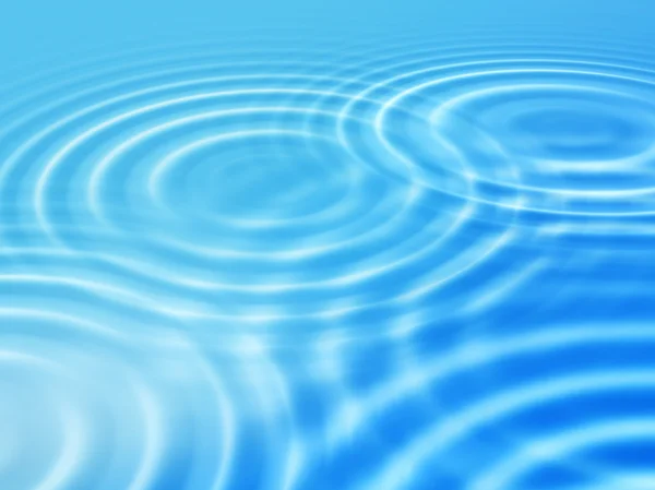 同心円の波紋と青い背景 — ストック写真