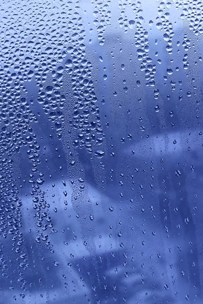 Gotas de água em vidro — Fotografia de Stock