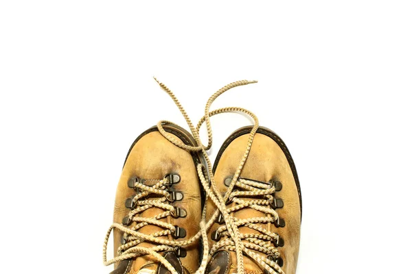 Fondo bianco con scarpe gialle — Foto Stock