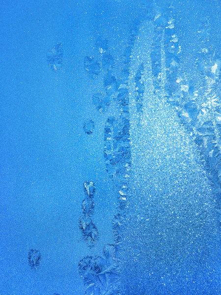 Padrão de gelo no vidro de inverno — Fotografia de Stock