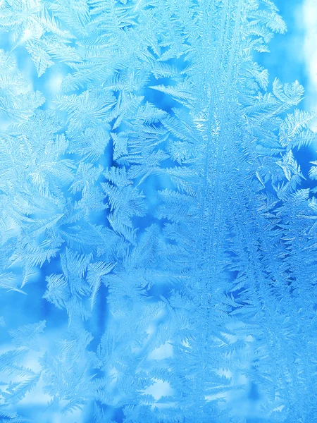 Padrão de gelo no vidro de inverno — Fotografia de Stock