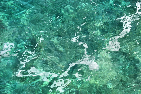 Fondo transparente de agua de mar — Foto de Stock