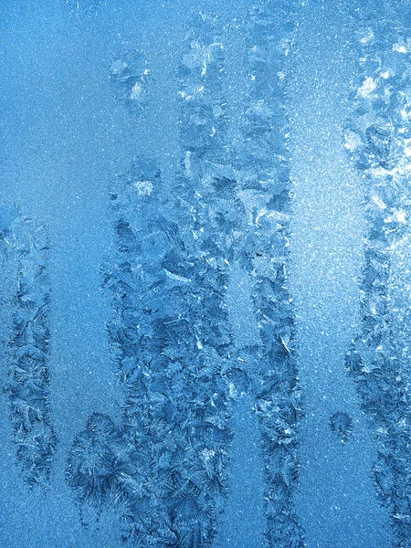 Patrón de hielo en vidrio de invierno —  Fotos de Stock