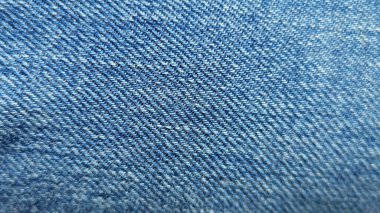 Açık mavi kot kumaş dokusuna yakın plan
