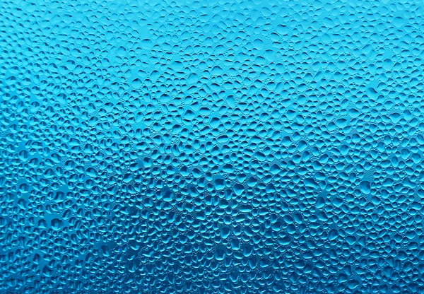 Gotas de agua sobre vidrio —  Fotos de Stock