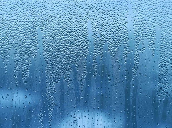 Gotas de água em vidro — Fotografia de Stock