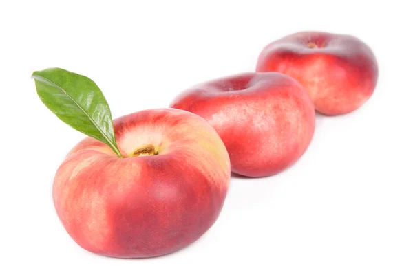 Плоский персики — стокове фото